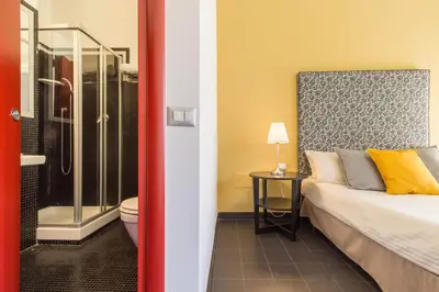 Letto o letti in una camera di Al Porto Di Cagliari