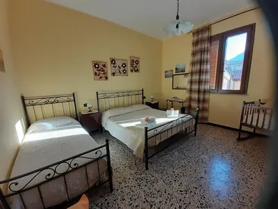 Letto o letti in una camera di L'Agrifoglio di Emy