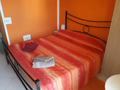 Letto o letti in una camera di B&B Panorama Cagliari