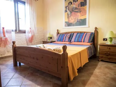 Letto o letti in una camera di Villetta Rombi