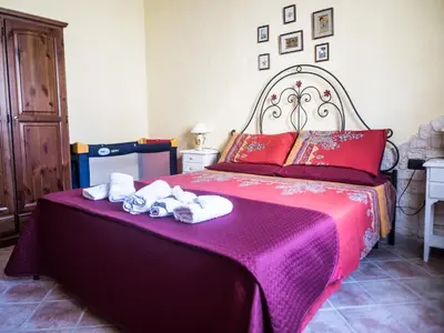 Letto o letti in una camera di Villetta Rombi