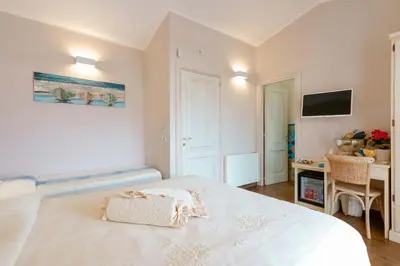 Letto o letti in una camera di La rosa dei venti