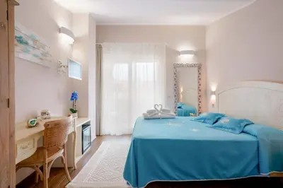 Letto o letti in una camera di La rosa dei venti