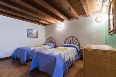 Letto o letti in una camera di Antica Tonnara Porto Paglia 