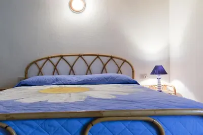 Letto o letti in una camera di Antica Tonnara Porto Paglia 