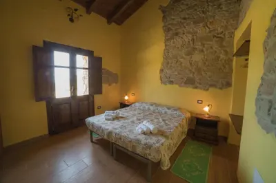 Letto o letti in una camera di Arroccas de is Istellas