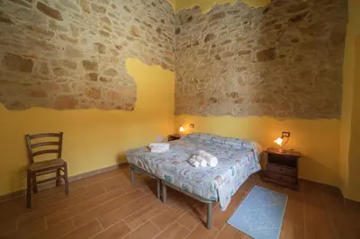 Letto o letti in una camera di Arroccas de is Istellas