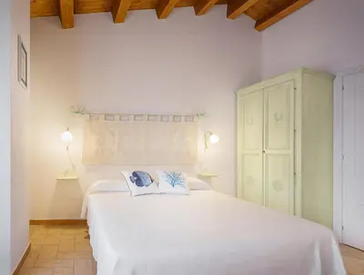 Letto o letti in una camera di Edomat