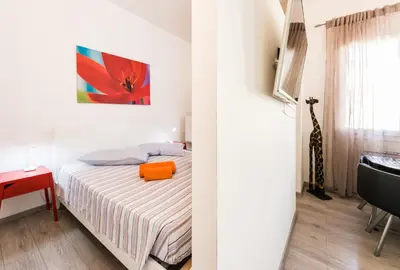 Letto o letti in una camera di Geco's Apartment