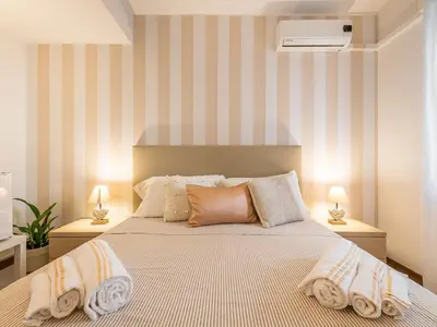 Letto o letti in una camera di Villa Vaghi Rooms
