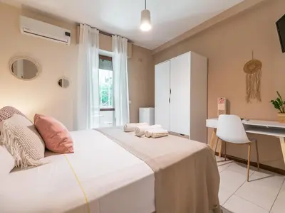 Letto o letti in una camera di Villa Vaghi Rooms
