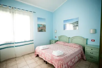 Letto o letti in una camera di Agriturismo Archelao