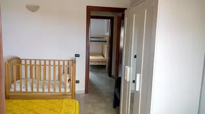 Letto o letti in una camera di Villetta Albachiara