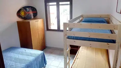 Letto o letti in una camera di Villetta Albachiara