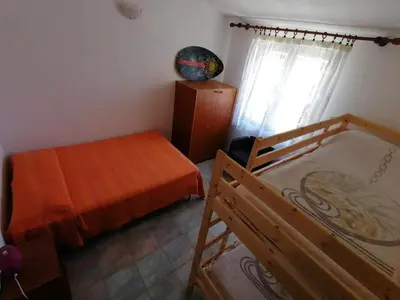 Letto o letti in una camera di Villetta Albachiara