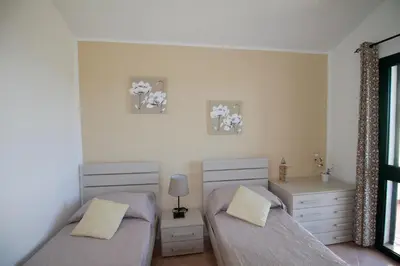 Letto o letti in una camera di La Veduta