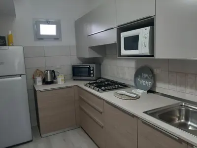 Cucina o angolo cottura di Sa Corte Antiga
