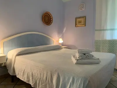 Letto o letti in una camera di Sant'Elmo Holiday Residence