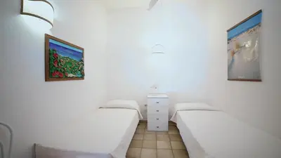 Letto o letti in una camera di Sant'Elmo Holiday Residence