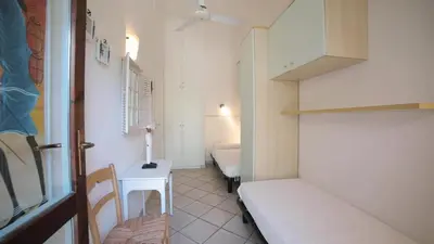 Letto o letti in una camera di Sant'Elmo Holiday Residence
