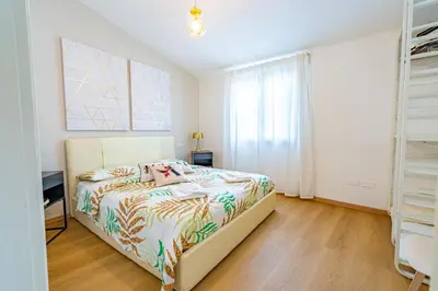 Letto o letti in una camera di Liberty Suite