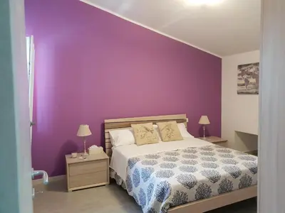 Letto o letti in una camera di Sea view