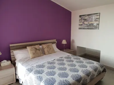 Letto o letti in una camera di Sea view