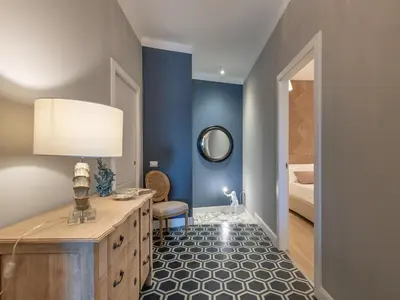 Letto o letti in una camera di AQUAMADRE Suites