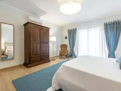 Letto o letti in una camera di Villa Iole Apartment
