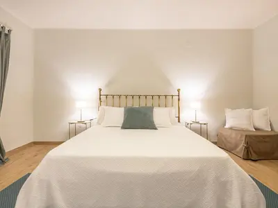 Letto o letti in una camera di Villa Iole Apartment