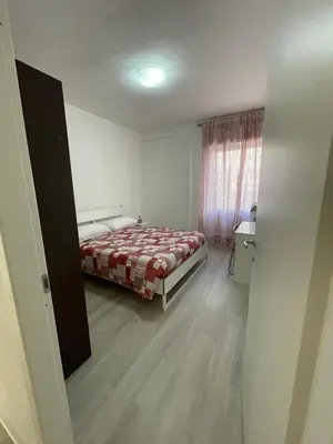 Letto o letti in una camera di La Terrazza Apartment