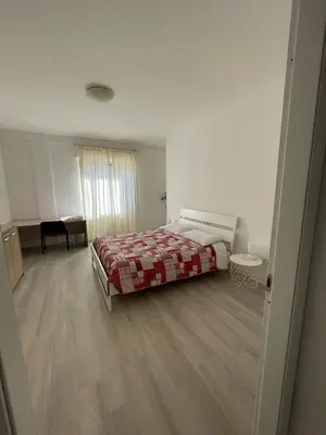 Letto o letti in una camera di La Terrazza Apartment