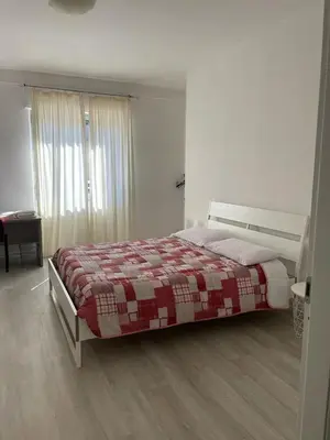 Letto o letti in una camera di La Terrazza Apartment