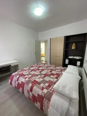 Letto o letti in una camera di La Terrazza Apartment