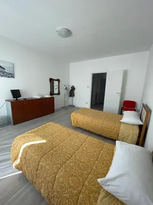 Letto o letti in una camera di La Terrazza Apartment