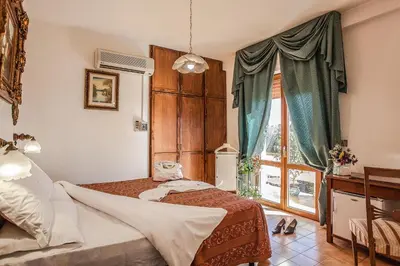 Letto o letti in una camera di Hotel Garden