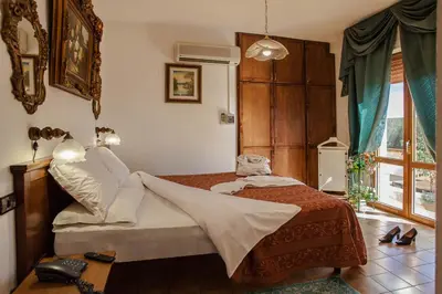 Letto o letti in una camera di Hotel Garden