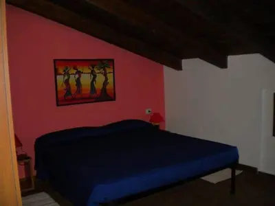Letto o letti in una camera di Affittacamere Luti
