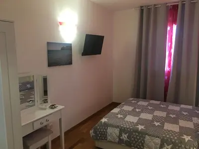 Letto o letti in una camera di Blue Sea Rooms Apartment Cagliari