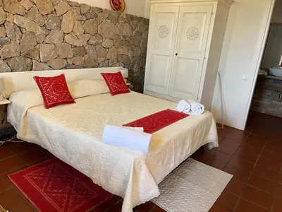Letto o letti in una camera di Antico Casale del Poggio