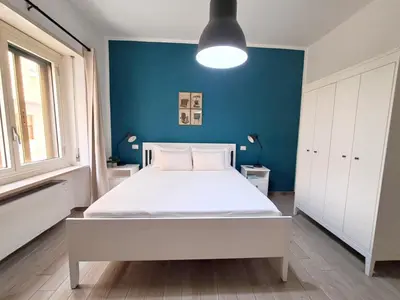 Letto o letti in una camera di Ajana Rooms by Accomodo