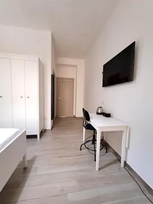 TV o dispositivi per l'intrattenimento presso Ajana Rooms by Accomodo