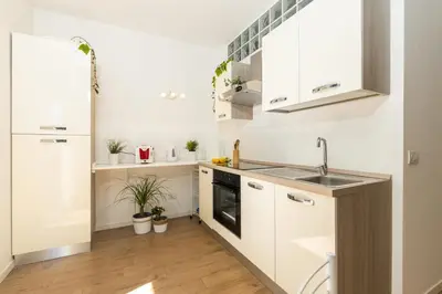 Cucina o angolo cottura di Casa Olivastro Millenario B