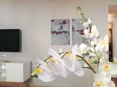 TV o dispositivi per l'intrattenimento presso Helmi34 - Appartamento dotato di tutti i comfort nel centro di Cagliari