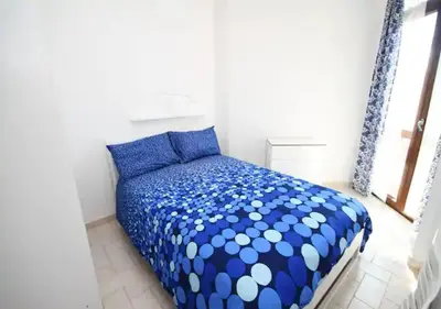Letto o letti in una camera di Appartamento Sul Mare