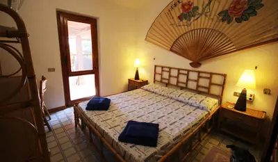Letto o letti in una camera di Villa Maria Francesca near beach