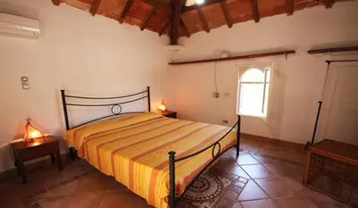 Letto o letti in una camera di Villa Maria Francesca near beach