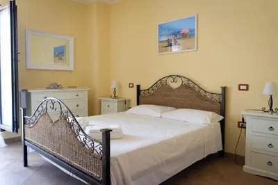 Letto o letti in una camera di Maya Holiday Home
