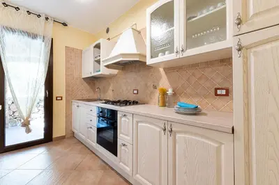 Cucina o angolo cottura di Maya Holiday Home