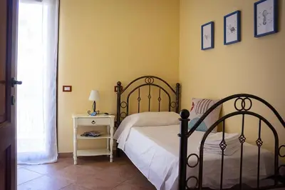 Letto o letti in una camera di Maya Holiday Home